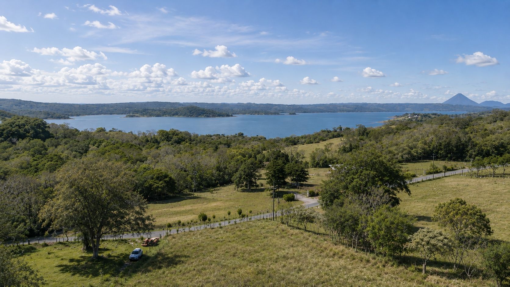 Lake Arenal from above with the volcano on the horizon